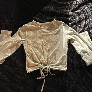 Long sleeve, light green Hollister shirt.